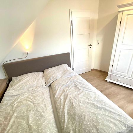 Ferienwohnungen Meerhuus_ 45229 Ditzum Pokoj fotografie